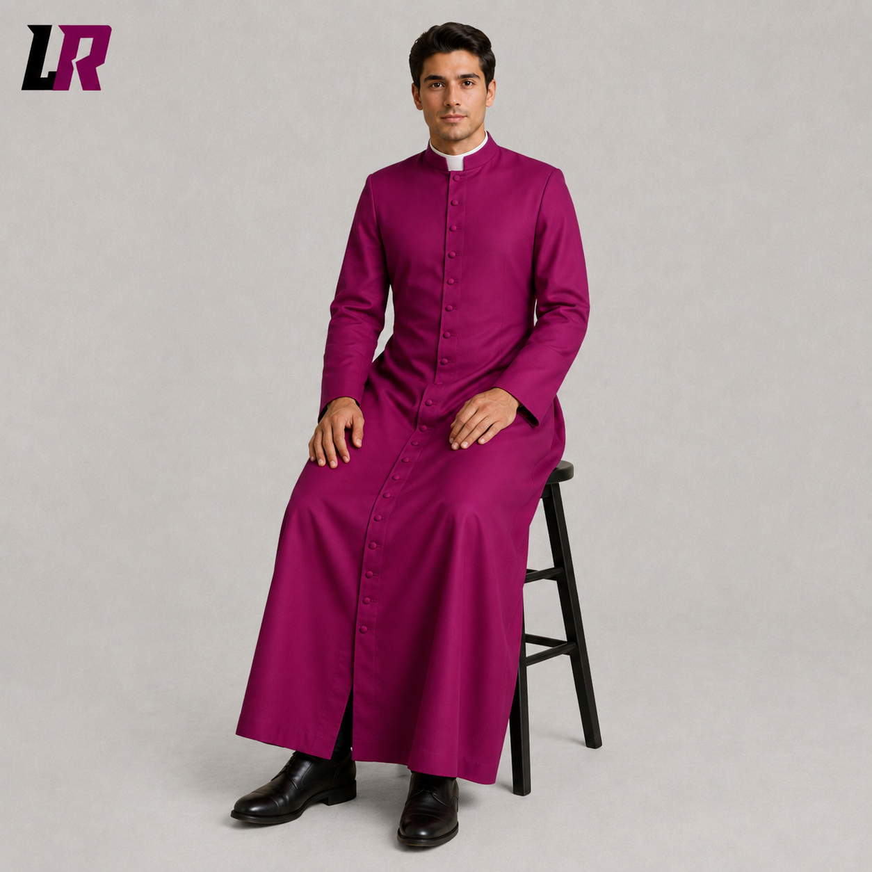 Priest sitting on a stool wearing a purple full-length clergy cassock for church services and liturgical celebrations