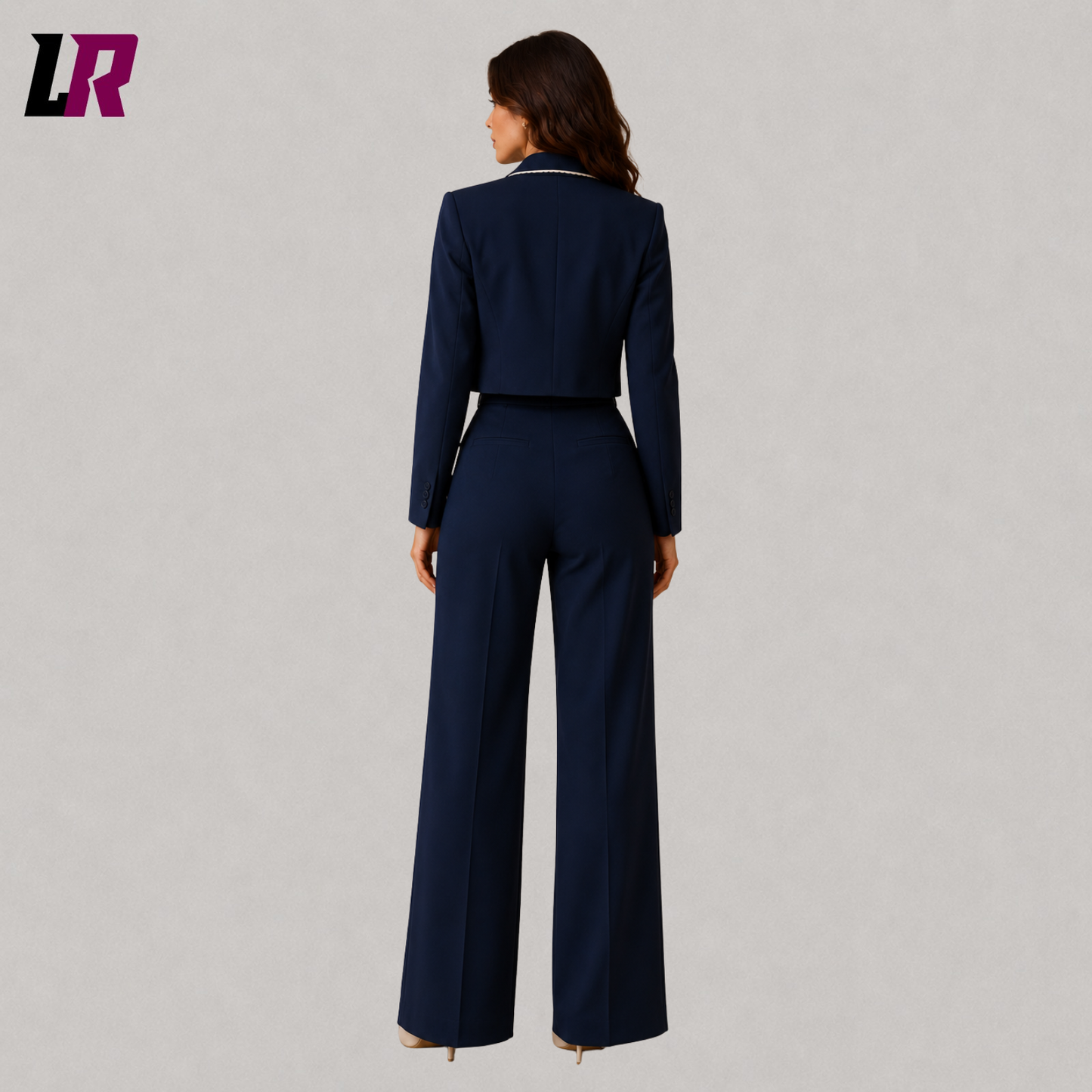 Back view of women's navy blue pantsuit with wide-leg trousers and tailored fit