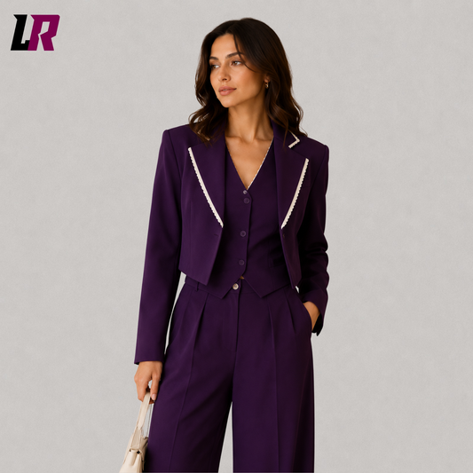 Close-up of women's plum purple business suit featuring cropped blazer and premium tailoring