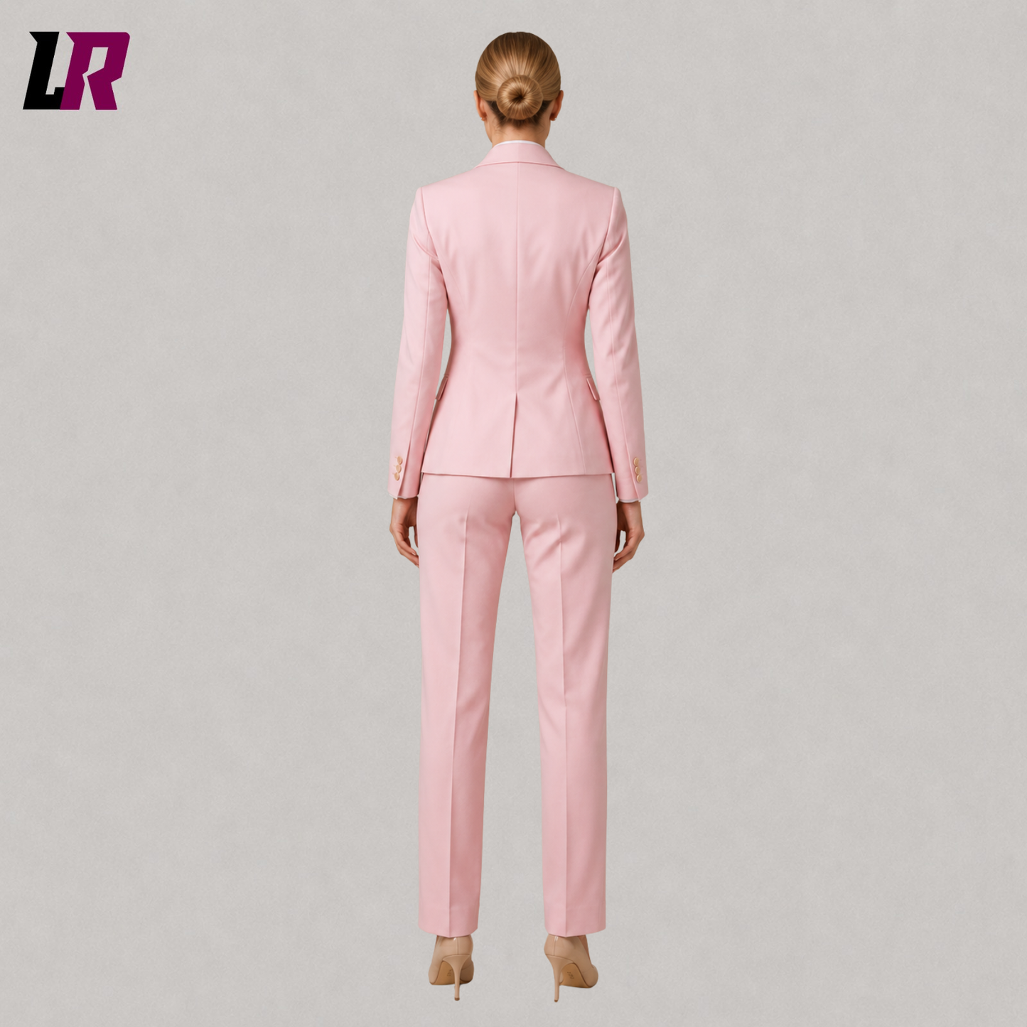 Back view of women's pink tailored blazer suit showcasing the elegant professional design