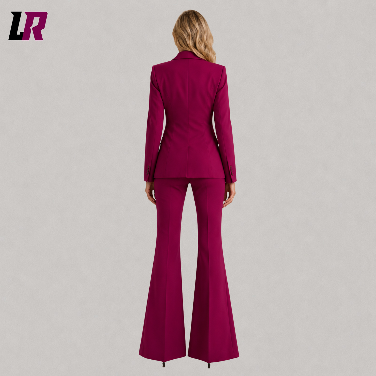 Back view of women's magenta two-piece business suit showcasing the elegant tailored fit
