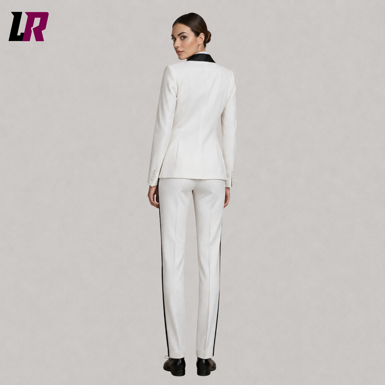 Back view of women’s white tuxedo suit showing tailored blazer fit and elegant formal design