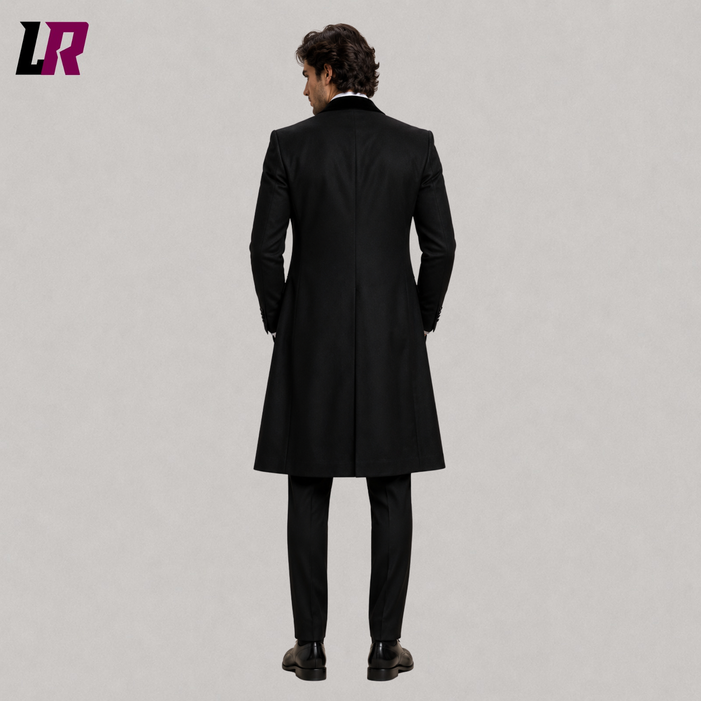 Back view of men's Victorian black Gothic tailcoat suit showing long coat design