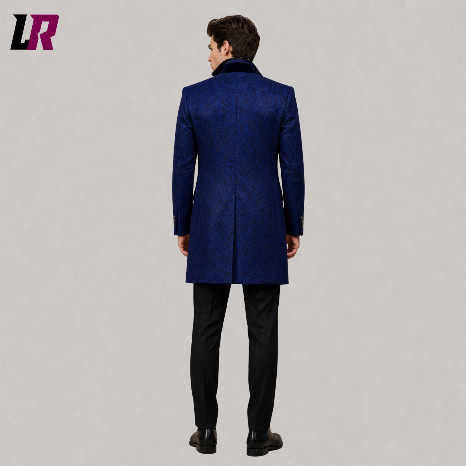 Back view of men's royal blue Victorian tailcoat showing long elegant silhouette