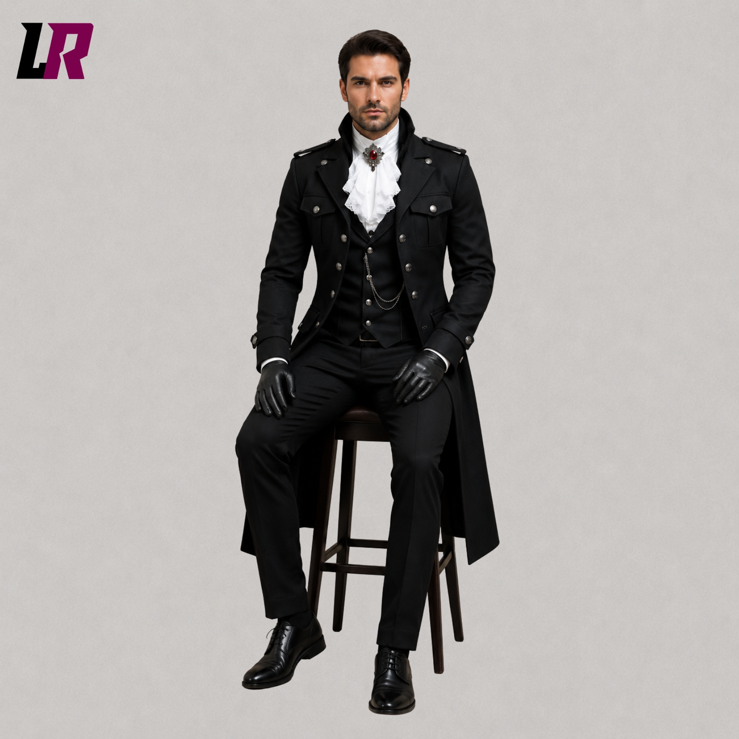 Man sitting on a stool wearing a black Gothic military Victorian tailcoat for weddings and formal occasions
