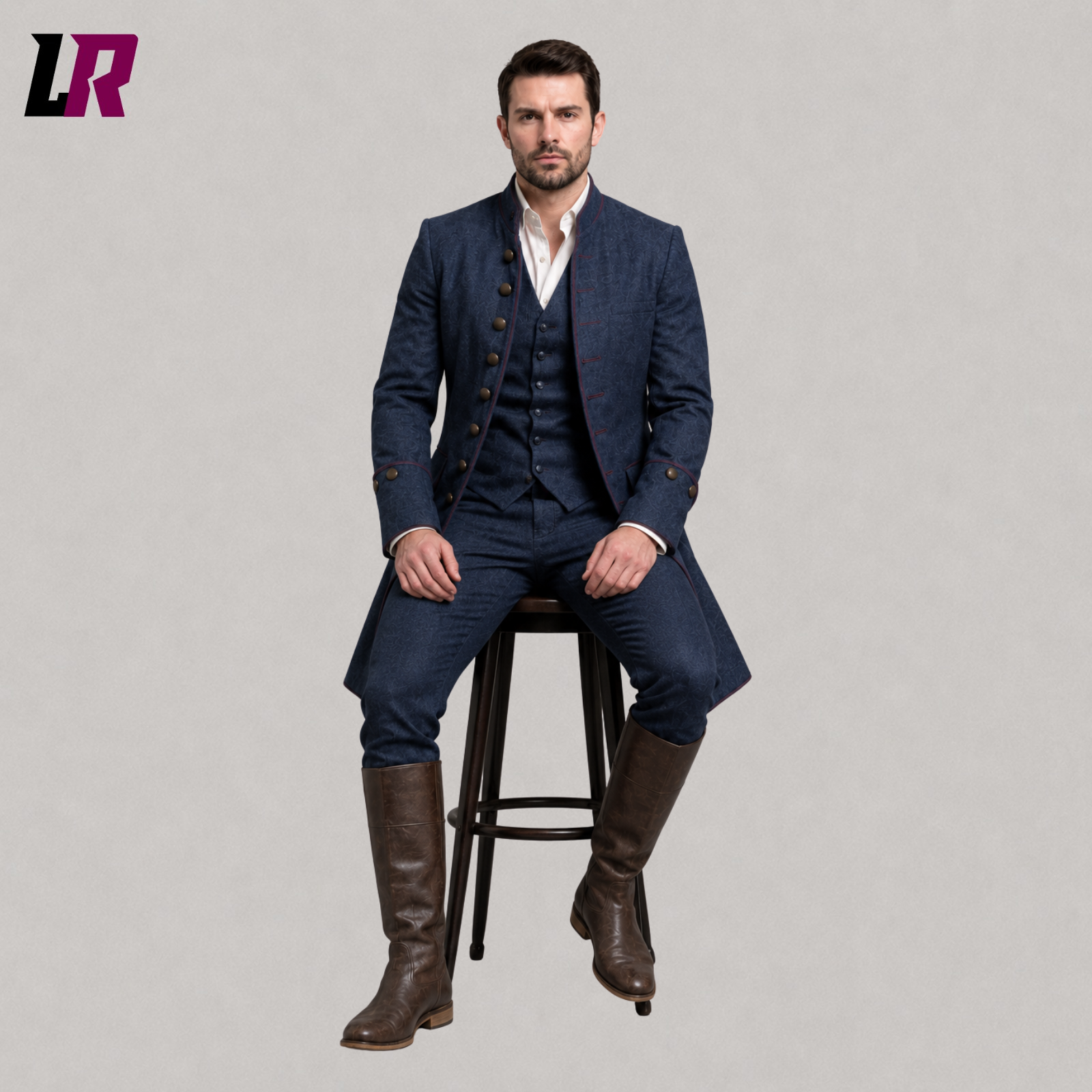 Man sitting on a stool wearing a blue Victorian Edwardian 3-piece tailcoat suit for weddings and formal occasions