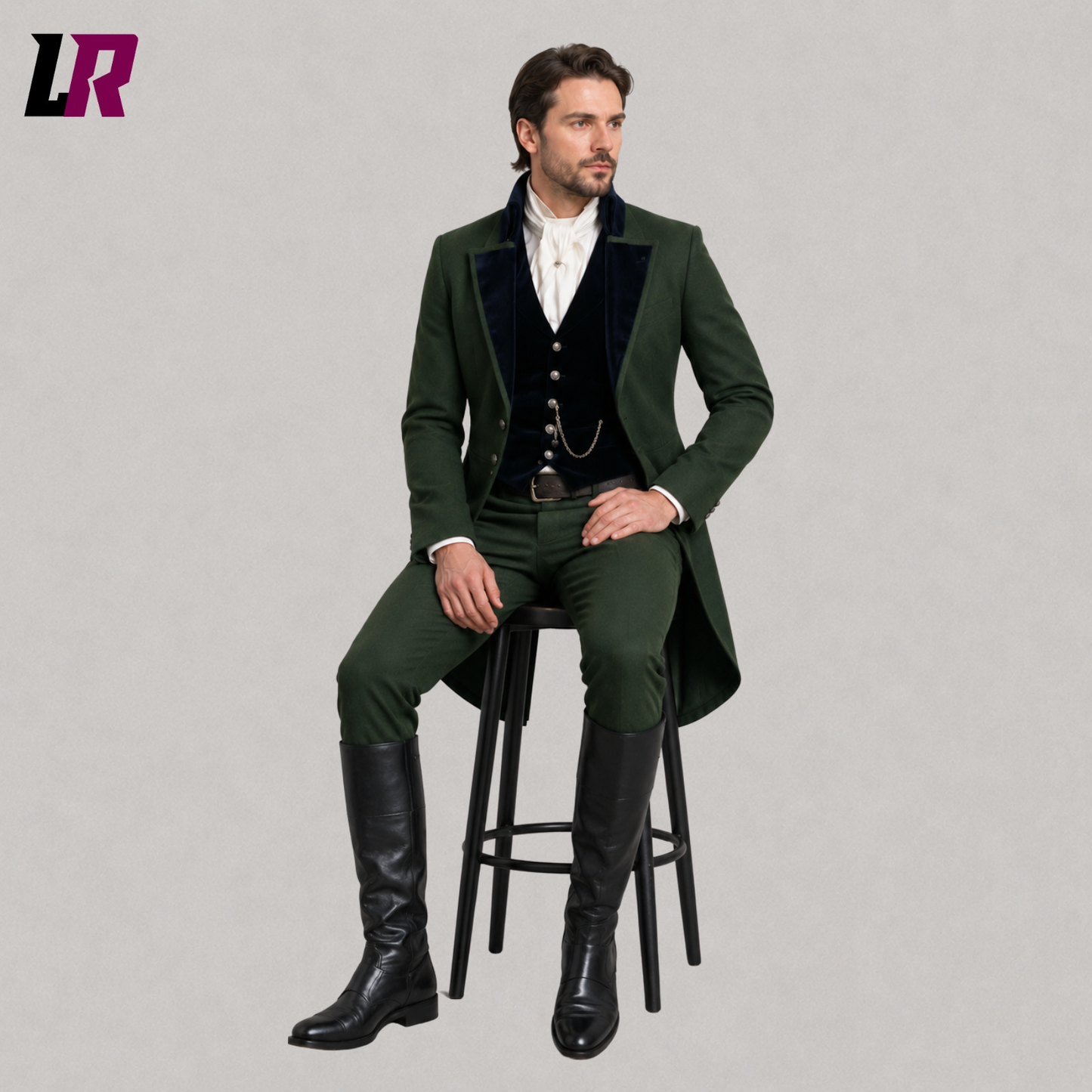 Man sitting on a stool wearing a green Victorian Edwardian 3-piece tailcoat suit for weddings and formal occasions