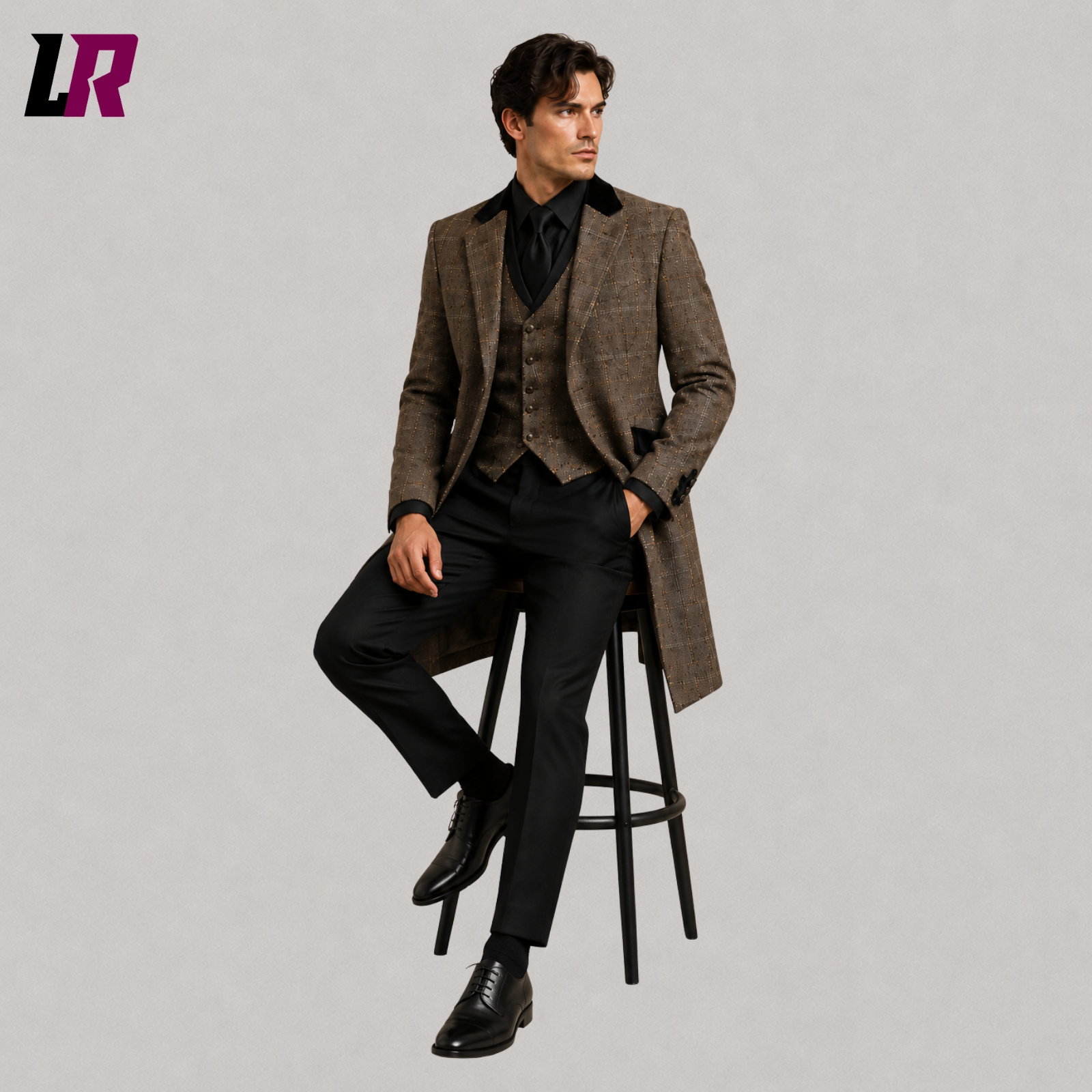 Man sitting on a stool wearing a brown plaid Regency Victorian tailcoat suit for weddings and formal occasions