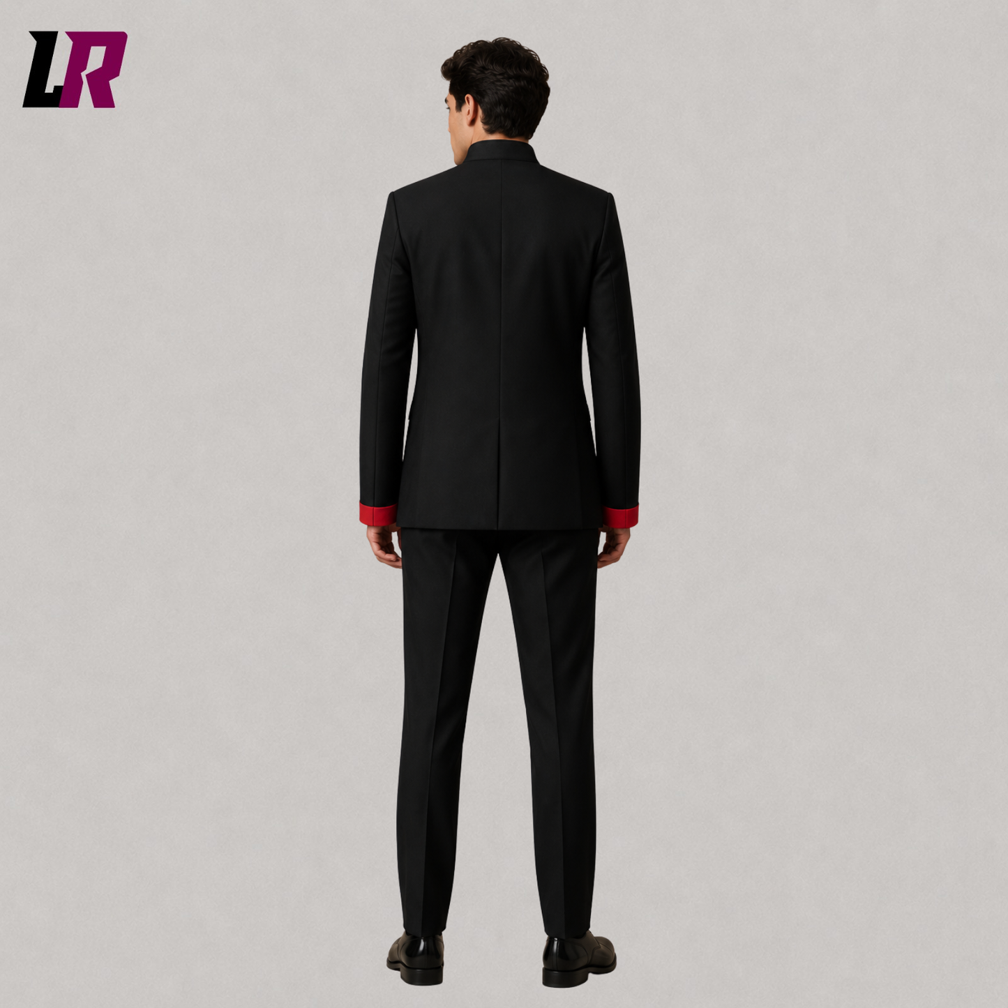 Back view of men's black Mandarin collar minimalist formal suit showing the clean tailored silhouette