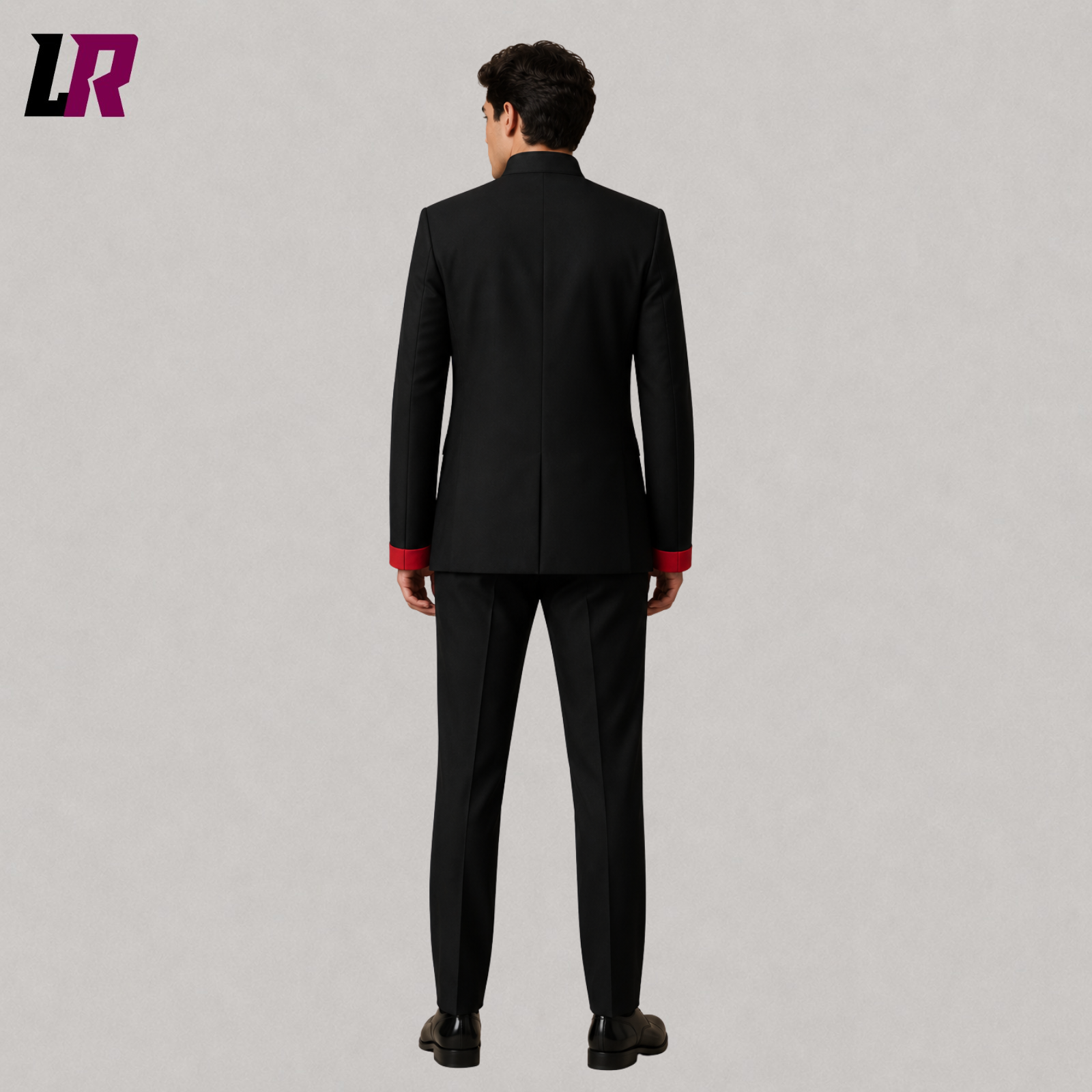 Back view of men's black Mandarin collar minimalist formal suit showing the clean tailored silhouette