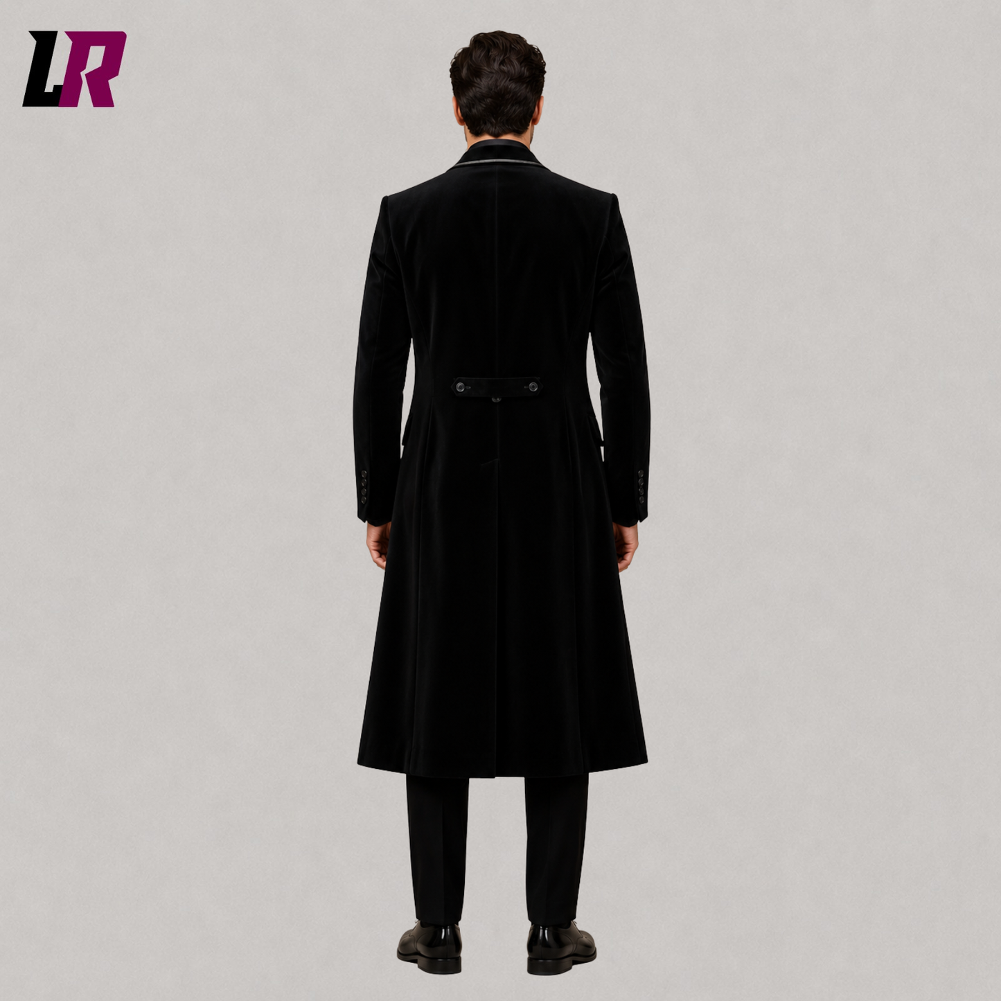 Back view of men's black velvet Regency tailcoat suit showing the elegant long frock coat silhouette