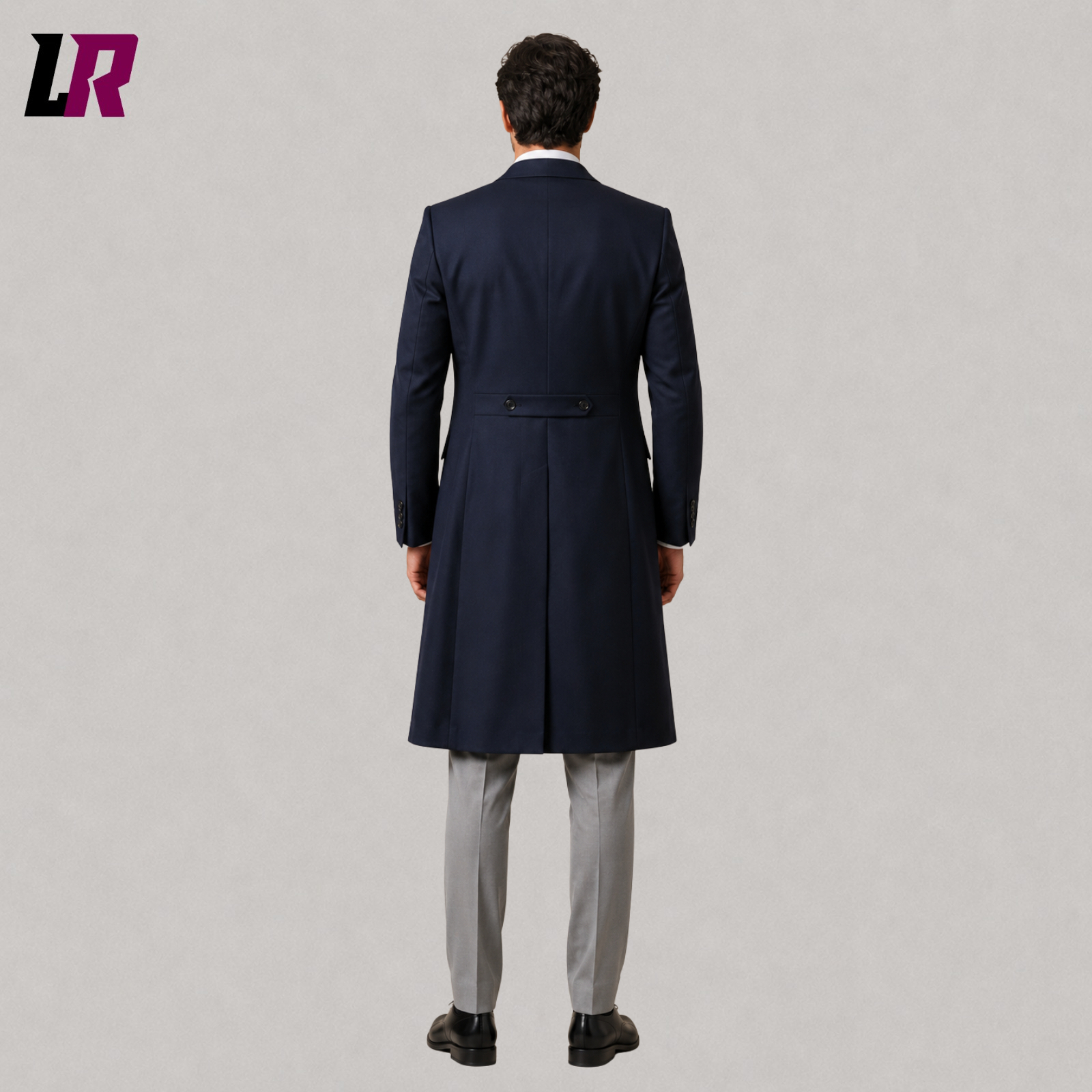 Back view of men's navy blue Victorian tailcoat suit showing the elegant long morning coat silhouette