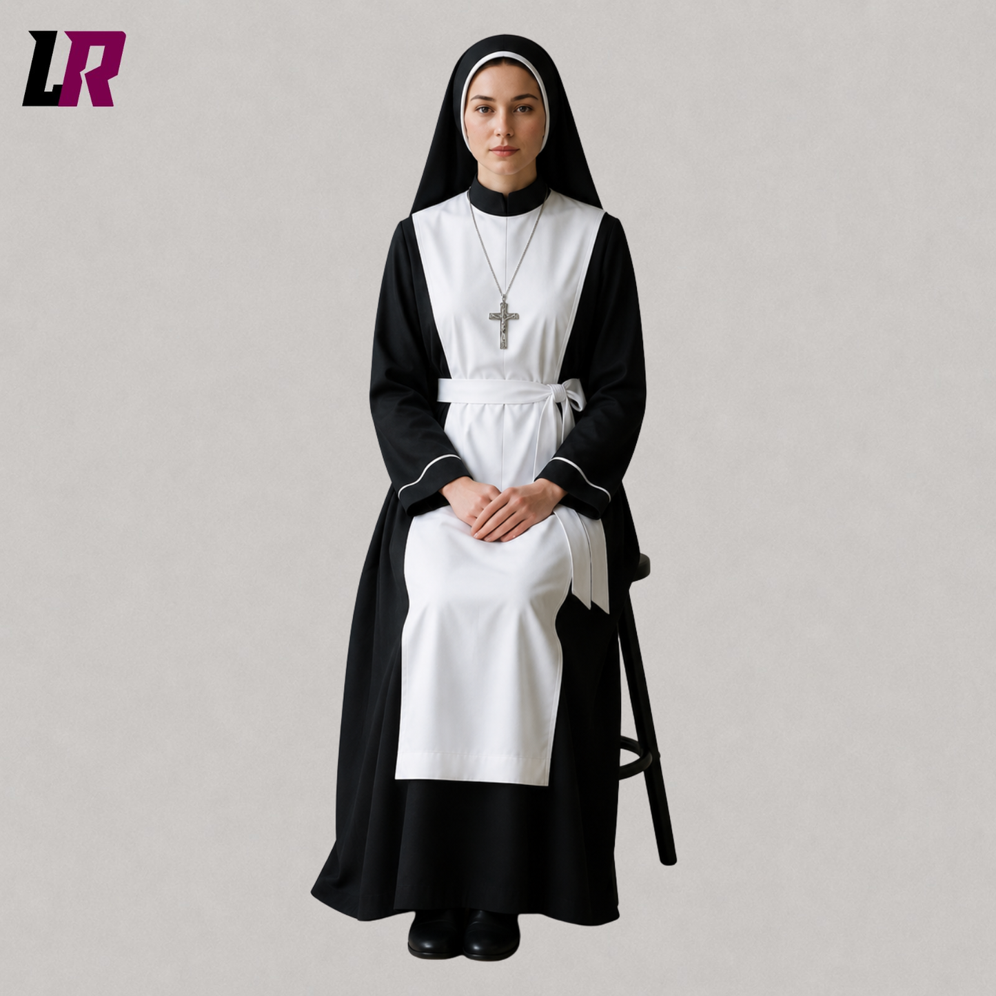 Woman sitting on a stool wearing a traditional black and white nun-inspired habit dress with matching headpiece for cosplay and theater
