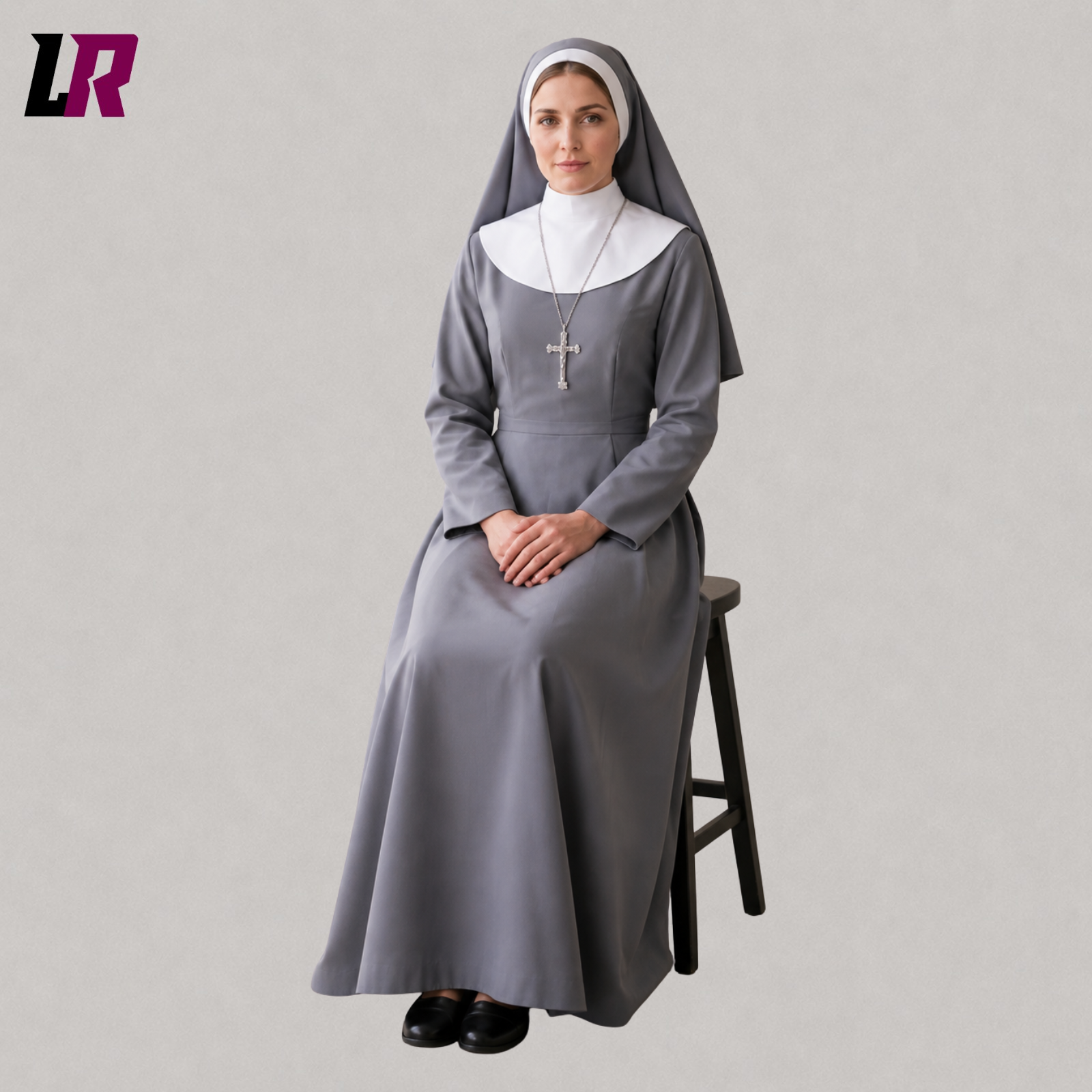 Woman sitting on a stool wearing a custom full-length Catholic nun habit dress with long sleeves