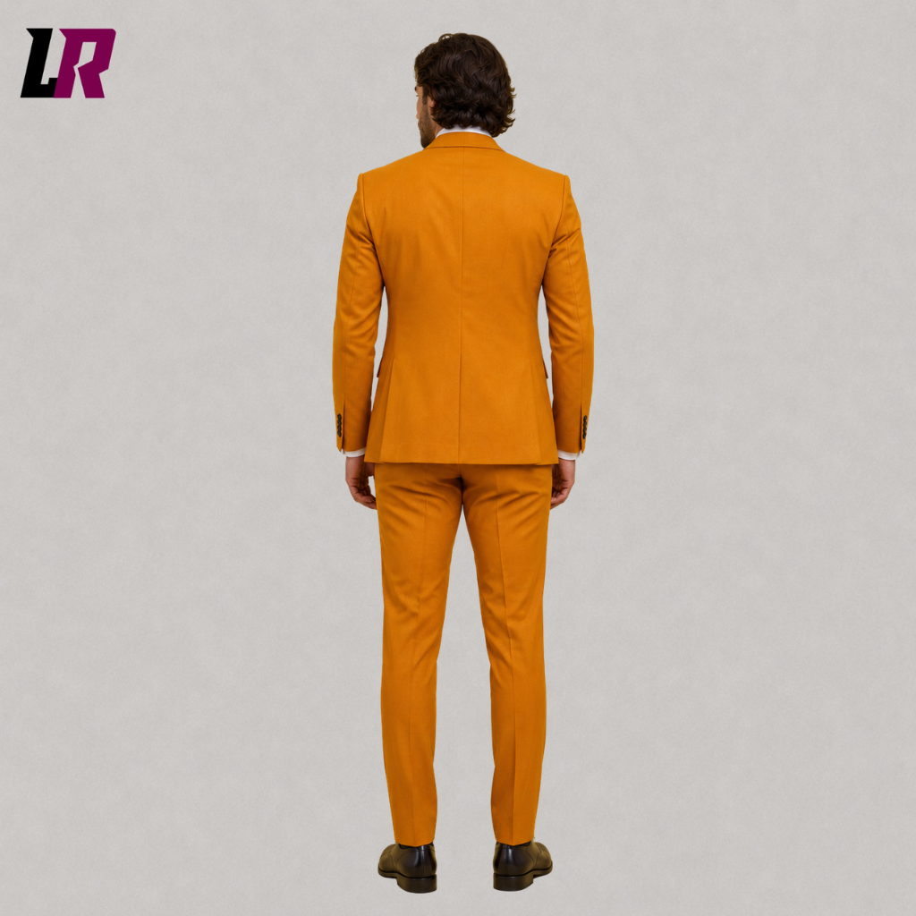 Back view of a men's mustard wedding suit showing the elegant slim-fit tailored silhouette