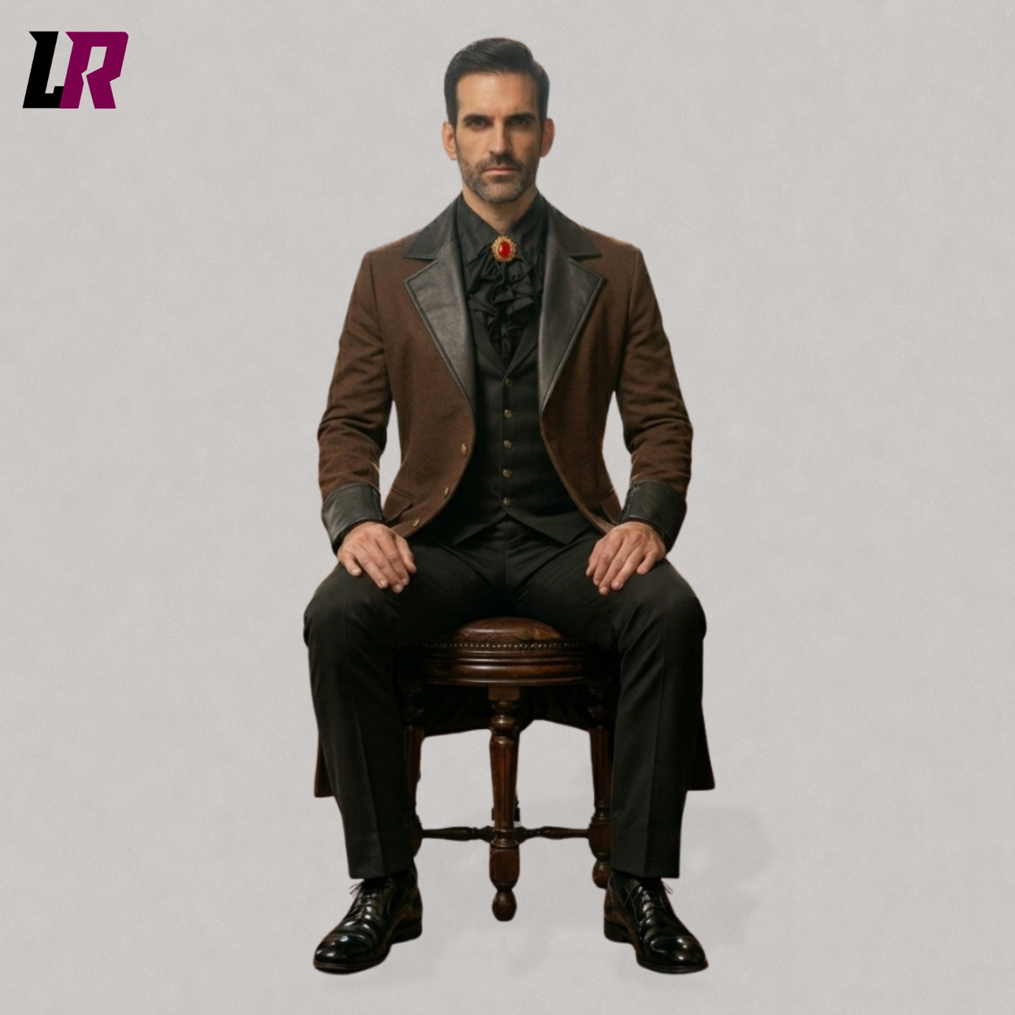 Full body seated portrait of a man wearing a brown Victorian gothic tailcoat with black lapels
