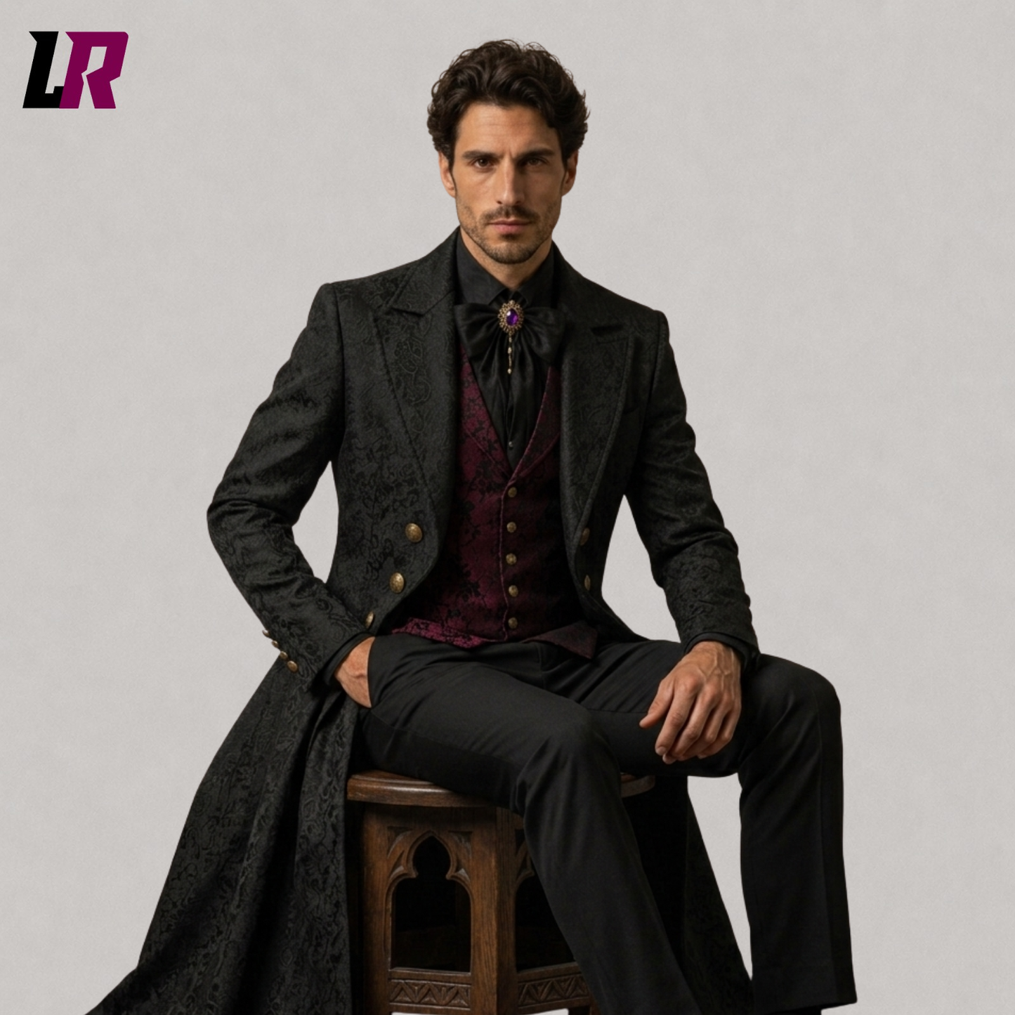 Full body seated portrait of a man wearing a black Gothic tailcoat and burgundy waistcoat formal outfit