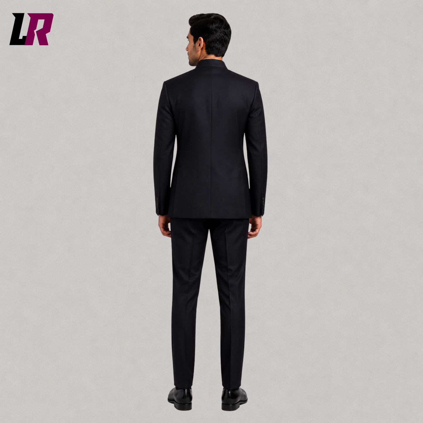 Back view of men's black Chinese tunic suit with a tailored minimalist fit