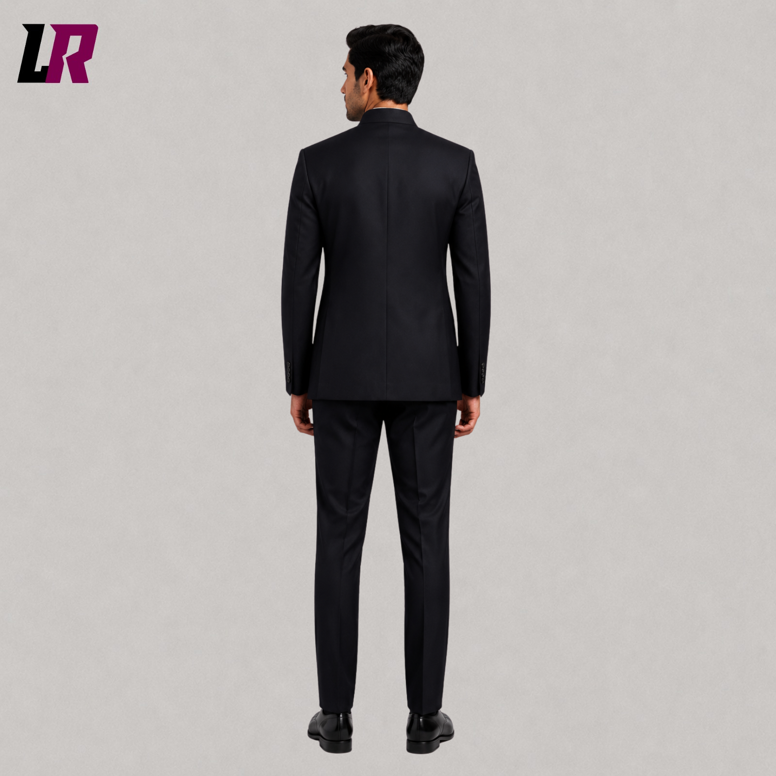Back view of men's black Chinese tunic suit with a tailored minimalist fit