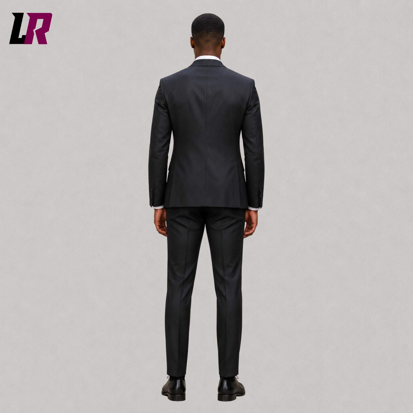 Back view of custom charcoal grey men's suit with modern tailored silhouette