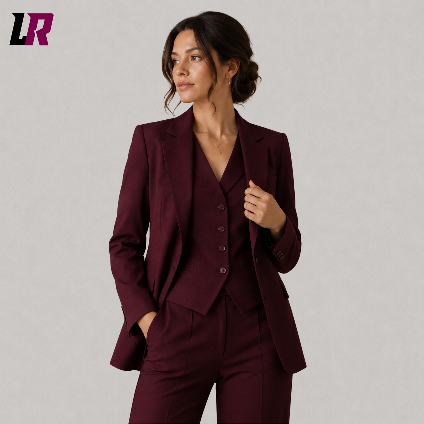 Close-up of burgundy women's formal blazer and vest featuring premium handmade tailoring