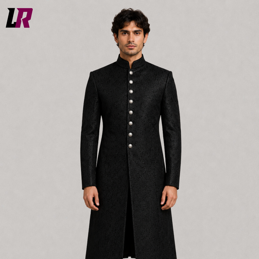 Close-up of men's black brocade sherwani coat featuring luxurious Gothic Victorian detailing