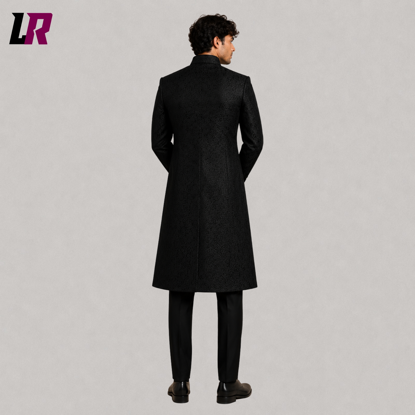 Back view of men's black brocade sherwani coat showcasing the elegant long prince coat design