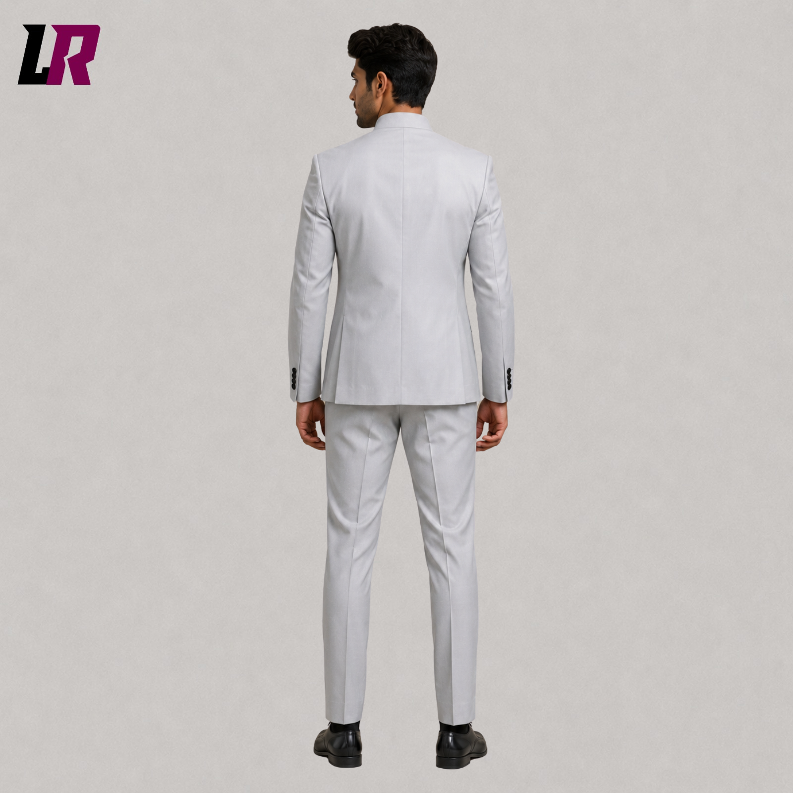 Back view of men's light grey Bandhgala suit with tailored Chinese tunic design